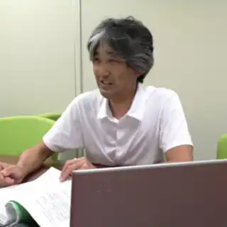 染谷 朝雄 氏